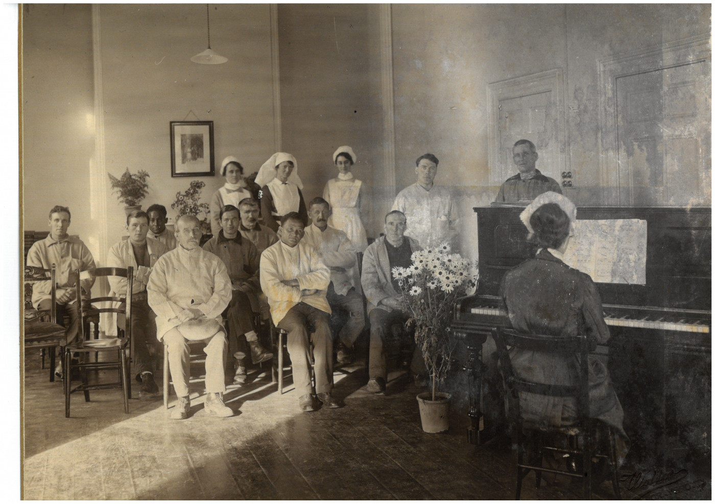 9 Picture 9 - Angas Home patients around the piano with nurses 1920s