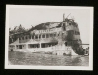 View of Seistan's side burst outward in way of the engine room, just aft of the ship's name