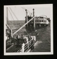 View of the Seistan's foredeck derrick, rigged to lift pumps in and out of the water